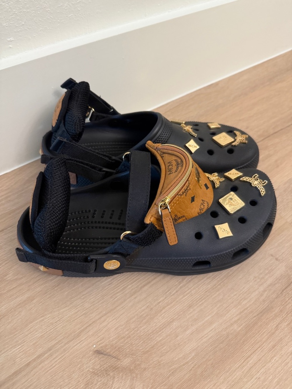 MCM Men’s Classic Clog Black with Brown MCM Pouch and Gold Accents